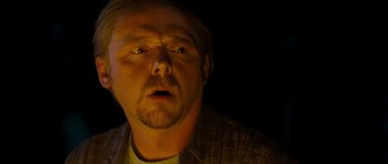 Movie still from “Paul” (2011), directed by Greg Mottola – A person with his mouth wide open; Close Up shot, Over the shoulder angle