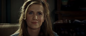 Movie still from “Paul” (2011), directed by Greg Mottola – A person with long hair; Close Up shot, Over the shoulder angle