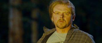 Movie still from “Paul” (2011), directed by Greg Mottola – A person wearing a jacket; Close Up shot, Over the shoulder angle