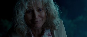 Movie still from “Paul” (2011), directed by Greg Mottola – An older woman is smiling for the camera; Close Up shot, Low angle