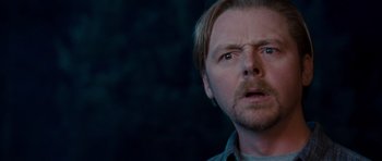 Movie still from “Paul” (2011), directed by Greg Mottola – A person with long hair and a goatee; Close Up shot, Over the shoulder angle