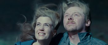 Movie still from “Paul” (2011), directed by Greg Mottola – A man and a woman laying on the ground; Close Up shot, Low angle