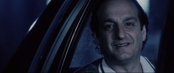 Movie still from “Payback” (1999), directed by Brian Helgeland – A person in a car; Close Up shot, Low angle