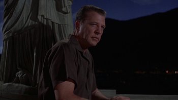 Movie still from “Pepe” (1960), directed by George Sidney – A person wearing a brown shirt; Medium shot, Low angle