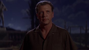 Movie still from “Pepe” (1960), directed by George Sidney – A person wearing a brown shirt; Close Up shot, Low angle