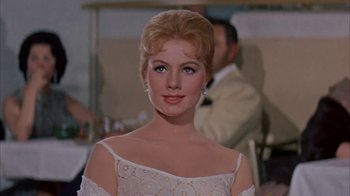 Movie still from “Pepe” (1960), directed by George Sidney – A person wearing a dress; Close Up shot, Low angle