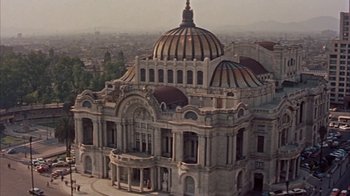 Movie still from “Pepe” (1960), directed by George Sidney – An aerial view of a large building with a dome; Extreme Wide shot, High angle
