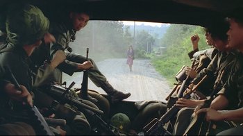 Movie still from “Peppermint Candy” (1999), directed by Lee Chang-dong – A group of soldiers sitting in a vehicle with guns; Wide shot, Over the shoulder angle