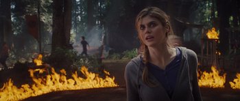 Movie still from “Percy Jackson: Sea of Monsters” (2013), directed by Thor Freudenthal – A woman standing in front of a fire in the woods; Close Up shot, Over the shoulder angle