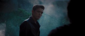 Movie still from “Percy Jackson: Sea of Monsters” (2013), directed by Thor Freudenthal – A man in a black jacket is standing in front of a foggy background; Close Up shot, Over the shoulder angle
