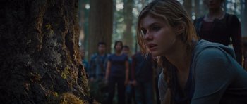 Movie still from “Percy Jackson: Sea of Monsters” (2013), directed by Thor Freudenthal – A woman looking at a tree in the woods; Close Up shot, Low angle