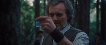 Movie still from “Percy Jackson: Sea of Monsters” (2013), directed by Thor Freudenthal – An older man holding something in his hand; Close Up shot, Low angle