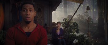 Movie still from “Percy Jackson: Sea of Monsters” (2013), directed by Thor Freudenthal – A man and a woman sitting on a bench; Medium shot, Over the shoulder angle