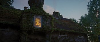 Movie still from “Percy Jackson: Sea of Monsters” (2013), directed by Thor Freudenthal – A building that has ivy growing on the roof of it; Wide shot, Low angle
