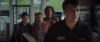 Movie still from “Percy Jackson: Sea of Monsters” (2013), directed by Thor Freudenthal – A man and two women are standing in front of a window; Close Up shot, Over the shoulder angle