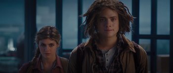 Movie still from “Percy Jackson: Sea of Monsters” (2013), directed by Thor Freudenthal – A man and a woman with dreadlocks in front of a window; Close Up shot, Low angle