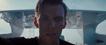 Movie still from “Percy Jackson: Sea of Monsters” (2013), directed by Thor Freudenthal – A man's face in front of an ocean; Close Up shot, Low angle