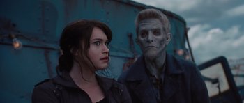 Movie still from “Percy Jackson: Sea of Monsters” (2013), directed by Thor Freudenthal – A woman standing next to a man in a dark place; Close Up shot, Over the shoulder angle