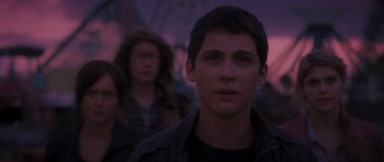 Movie still from “Percy Jackson: Sea of Monsters” (2013), directed by Thor Freudenthal – A young man standing in front of other young people; Close Up shot, Over the shoulder angle