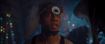 Movie still from “Percy Jackson: Sea of Monsters” (2013), directed by Thor Freudenthal – A man wearing a wig with an evil eye on his forehead; Close Up shot, Over the shoulder angle