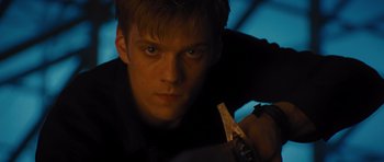 Movie still from “Percy Jackson: Sea of Monsters” (2013), directed by Thor Freudenthal – A man holding a pair of scissors in his hand; Close Up shot, Low angle