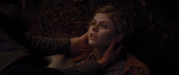 Movie still from “Percy Jackson: Sea of Monsters” (2013), directed by Thor Freudenthal – A woman laying on the ground with her hands on her neck; Close Up shot, Overhead angle