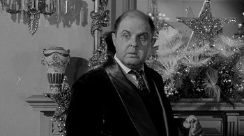 Movie still from “Period of Adjustment” (1962), directed by George Roy Hill – An older man wearing a suit and tie; Close Up shot, Over the shoulder angle