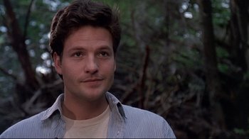 Movie still from “Pet Sematary” (1989), directed by Mary Lambert – A person wearing a striped shirt; Close Up shot, Low angle