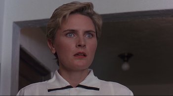 Movie still from “Pet Sematary” (1989), directed by Mary Lambert – A person with short blonde hair; Close Up shot, Low angle