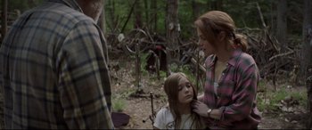 Movie still from “Pet Sematary” (2019), directed by Kevin Kölsch – A woman and a child in the woods; Medium shot, Over the shoulder angle