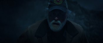 Movie still from “Pet Sematary” (2019), directed by Kevin Kölsch – An old man with a beard wearing a hat; Close Up shot, Low angle