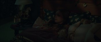 Movie still from “Pet Sematary” (2019), directed by Kevin Kölsch – A woman sleeping in a bed in the dark; Medium shot, High angle