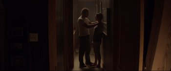 Movie still from “Pet Sematary” (2019), directed by Kevin Kölsch – A man and a woman standing in a room; Medium shot, Over the shoulder angle