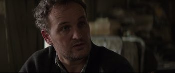 Movie still from “Pet Sematary” (2019), directed by Kevin Kölsch – A person wearing a jacket looking at the camera; Close Up shot, Over the shoulder angle