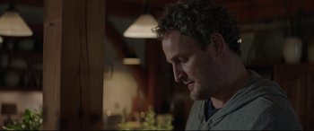 Movie still from “Pet Sematary” (2019), directed by Kevin Kölsch – A person looking down at something; Close Up shot, Over the shoulder angle