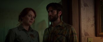 Movie still from “Pete's Dragon” (2016), directed by David Lowery – A man and a woman standing next to each other; Close Up shot, Over the shoulder angle