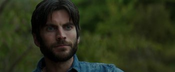 Movie still from “Pete's Dragon” (2016), directed by David Lowery – A person wearing a jean shirt; Close Up shot, Over the shoulder angle