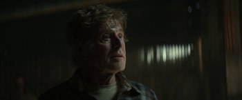 Movie still from “Pete's Dragon” (2016), directed by David Lowery – An older man looking up into the sky; Close Up shot, Low angle