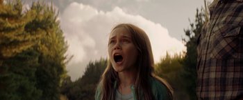 Movie still from “Pete's Dragon” (2016), directed by David Lowery – A young girl with her mouth wide open; Close Up shot, Low angle