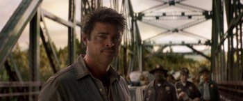 Movie still from “Pete's Dragon” (2016), directed by David Lowery – A person wearing a jacket; Close Up shot, Over the shoulder angle