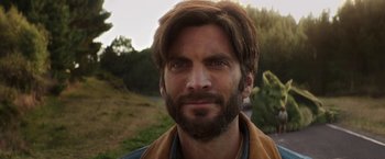 Movie still from “Pete's Dragon” (2016), directed by David Lowery – A person with a beard; Close Up shot, Over the shoulder angle