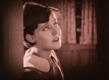 Movie still from “Peter Pan” (1924), directed by Herbert Brenon – An old photo of a woman looking up at the sky; Close Up shot, High angle