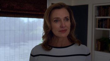 Movie still from “13 Reasons Why” (2017), created by Brian Yorkey – A person wearing a white and black shirt; Close Up shot, Over the shoulder angle