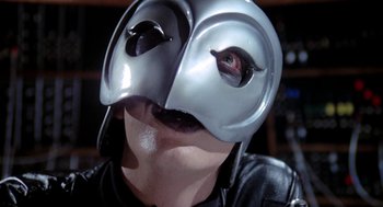 Movie still from “Phantom of the Paradise” (1974), directed by Brian De Palma – A man wearing a helmet with a bird's eye view of his face; Close Up shot, Low angle