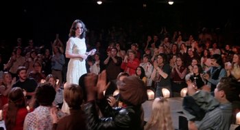 Movie still from “Phantom of the Paradise” (1974), directed by Brian De Palma – A woman in a white dress on a runway; Wide shot, High angle