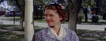 Movie still from “Picnic” (1955), directed by Joshua Logan – A person wearing a dress; Close Up shot, Low angle