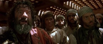 Movie still from “Pirates” (1986), directed by Roman Polanski – A group of men standing next to each other; Close Up shot, Low angle