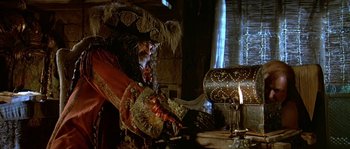 Movie still from “Pirates” (1986), directed by Roman Polanski – A man dressed as a pirate; Medium shot, Low angle