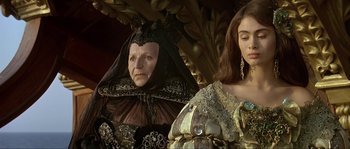 Movie still from “Pirates” (1986), directed by Roman Polanski – Two women dressed in renaissance clothing , one of which is wearing a veil; Close Up shot, Low angle