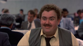 Movie still from “Planes, Trains & Automobiles” (1987), directed by John Hughes – A person wearing a tie; Close Up shot, Low angle